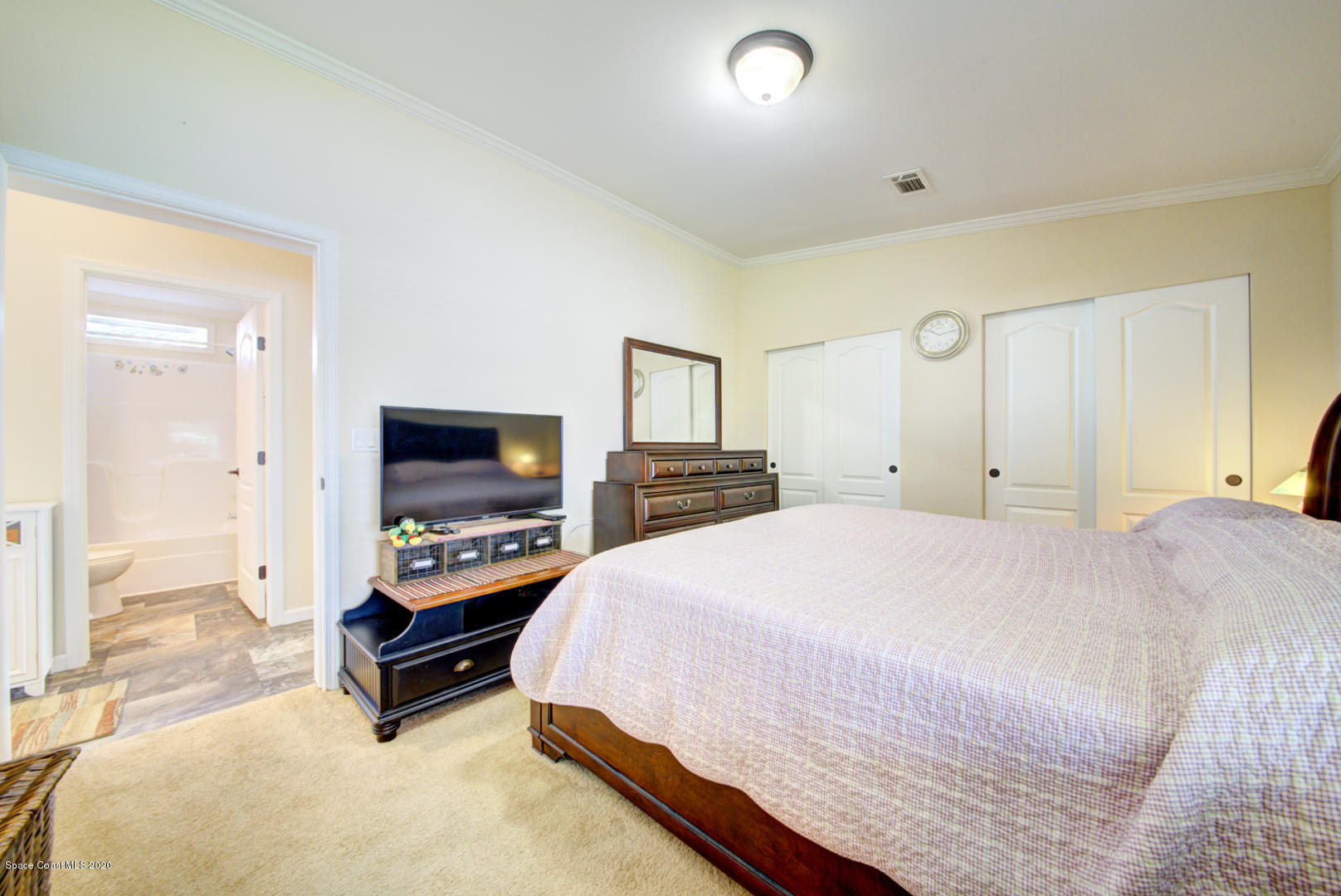 1256 Shell Court Northeast Palm Bay, FL 32907 - Photo 28 of 40 master bedroom with double closets