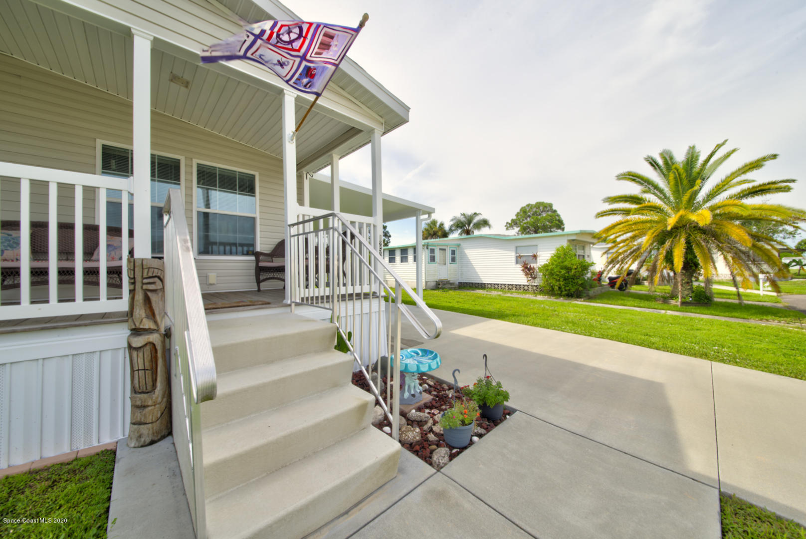 1256 Shell Court Northeast Palm Bay, FL 32907 - Photo 4 of 40 steps to front porch