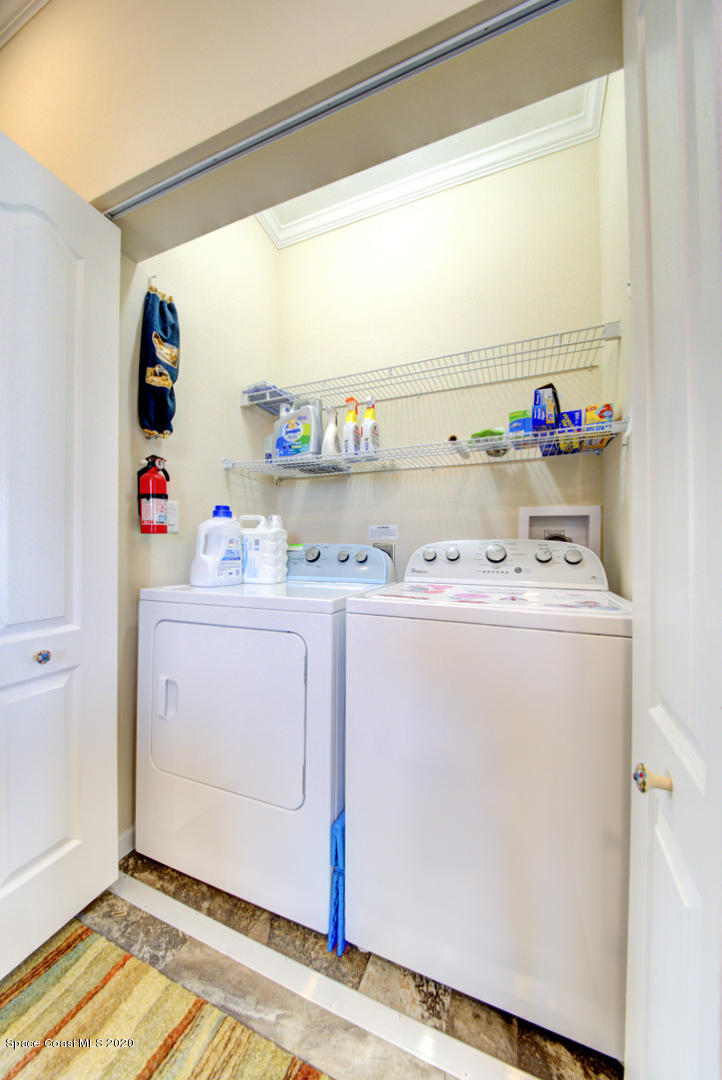 1256 Shell Court Northeast Palm Bay, FL 32907 - Photo 36 of 40 laundry closet
