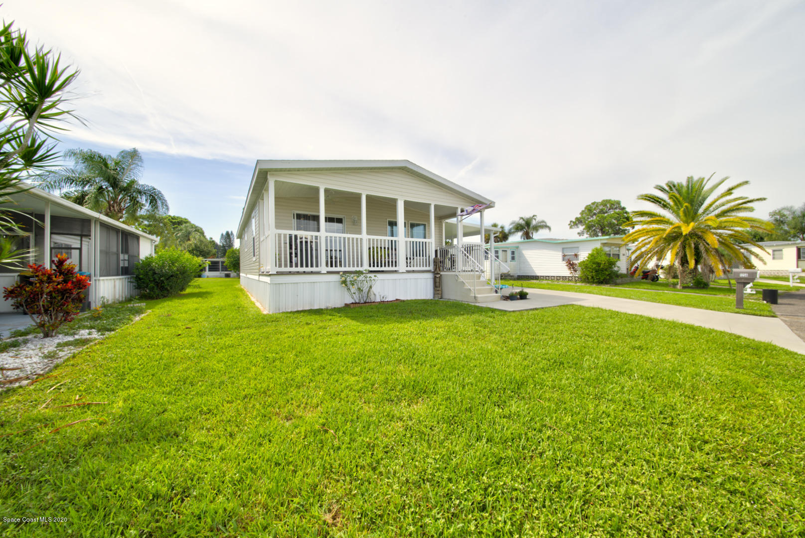 1256 Shell Court Northeast Palm Bay, FL 32907 - Photo 6 of 40 front yard left