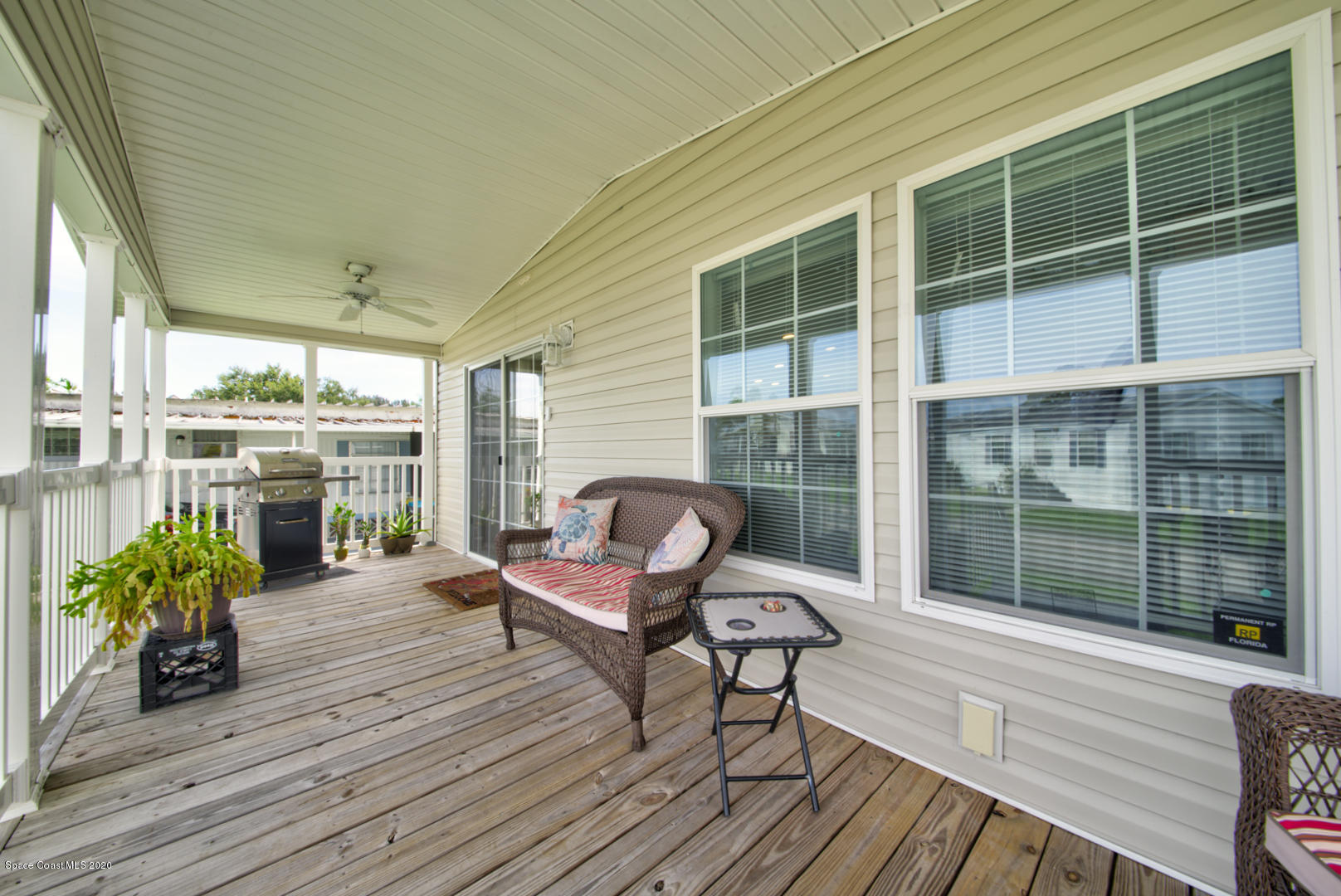 1256 Shell Court Northeast Palm Bay, FL 32907 - Photo 7 of 40 front porch with fan