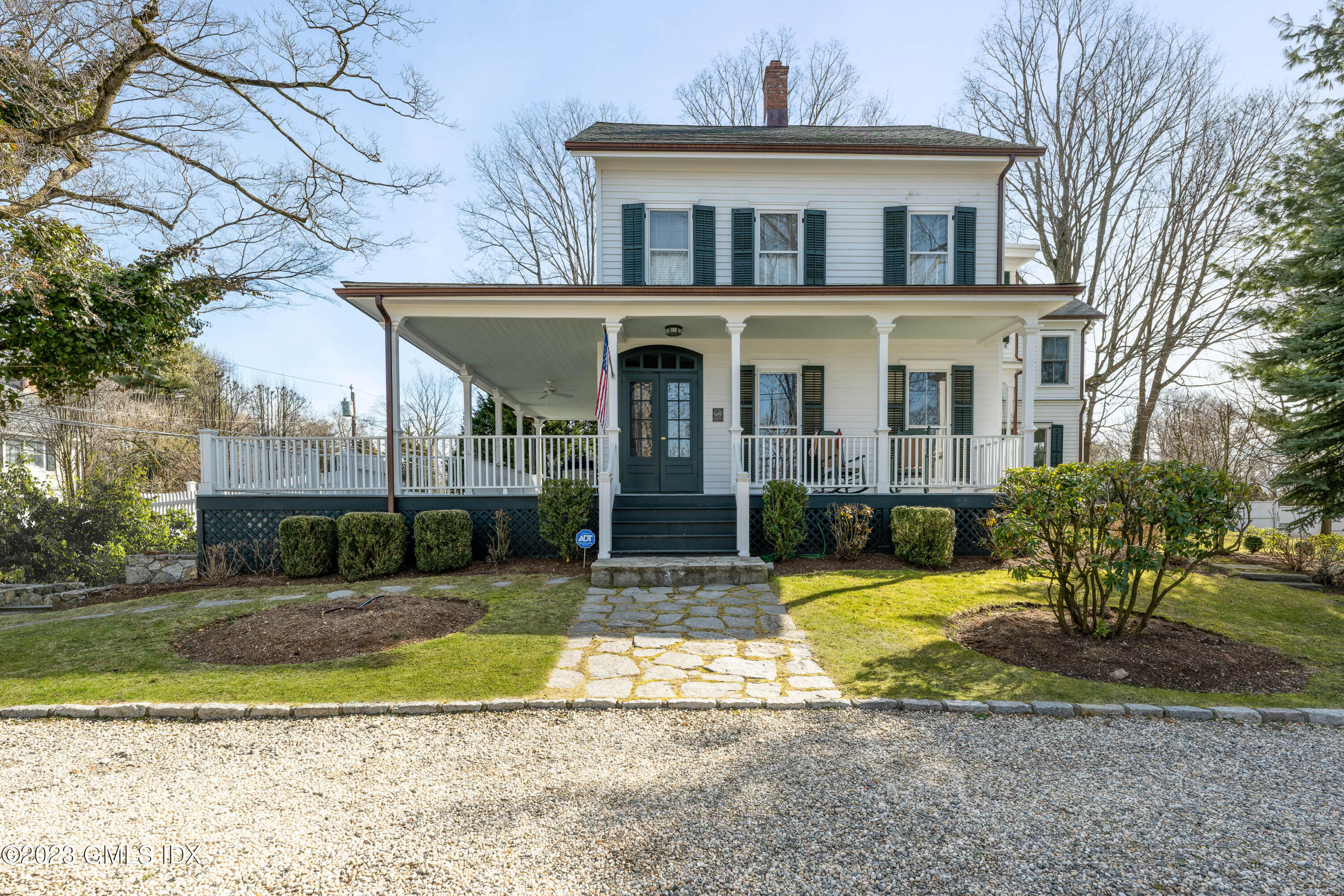 93 Riverside Avenue Riverside, CT 06878 - Photo 2 of 19 a front view of a house with a yard