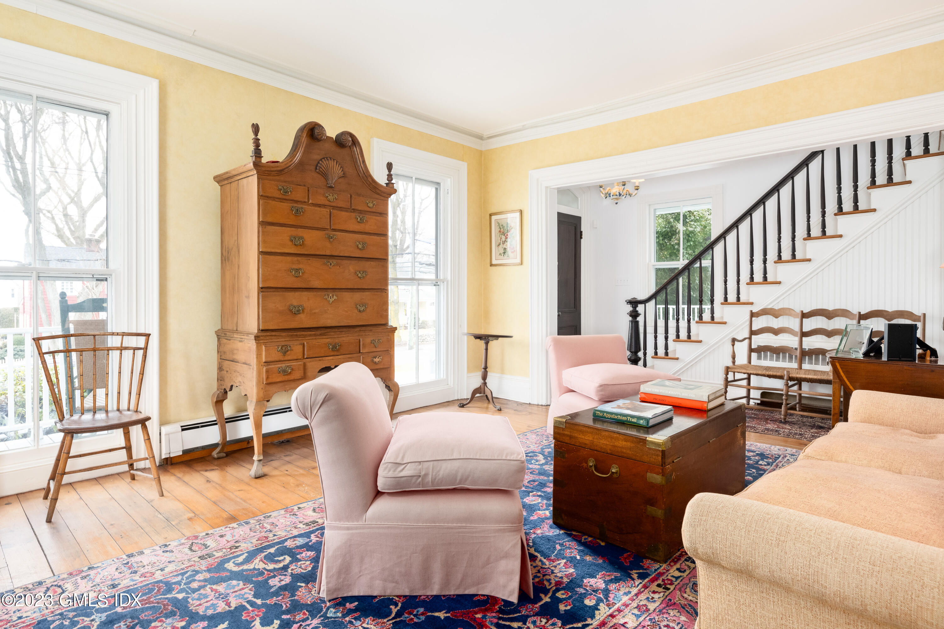 93 Riverside Avenue Riverside, CT 06878 - Photo 6 of 19 a living room with furniture and a floor to ceiling window