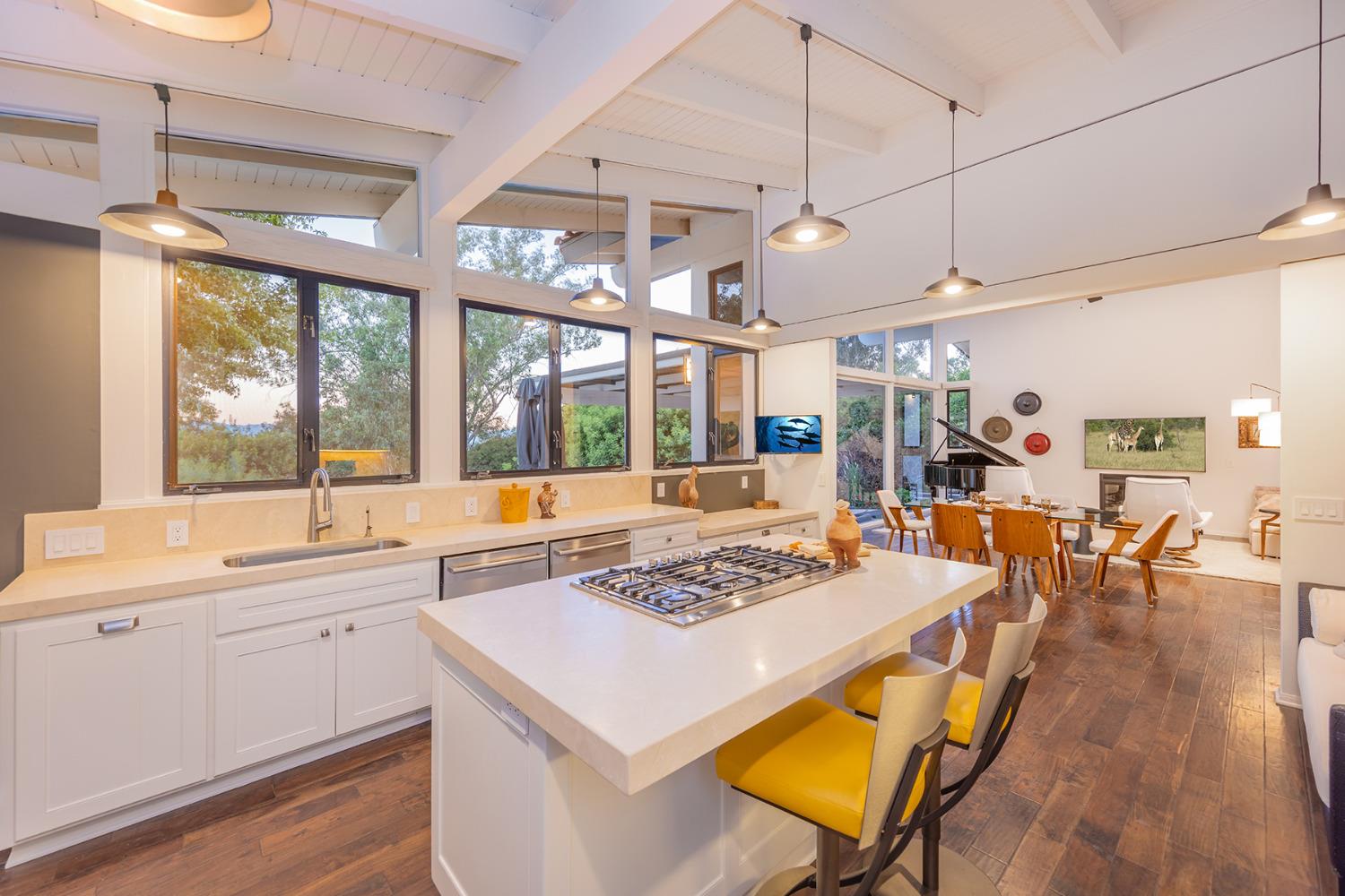 276 Running Ridge Trail Ojai, CA 93023 - Photo 12 of 31 a large kitchen with a table and chairs in it