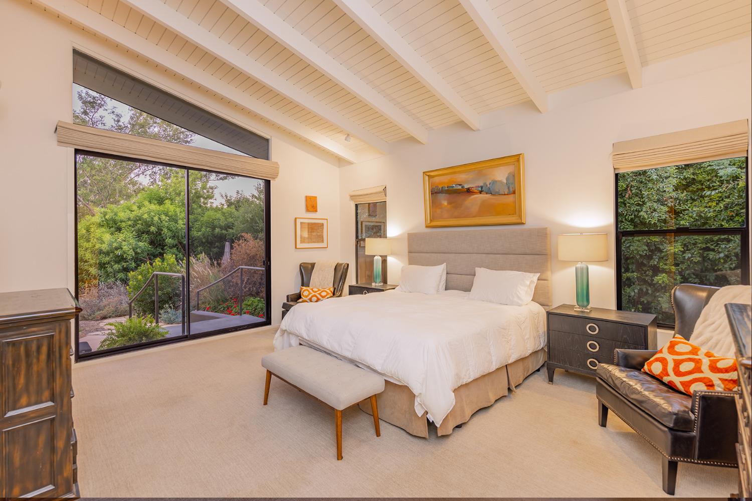 276 Running Ridge Trail Ojai, CA 93023 - Photo 16 of 31 a spacious bedroom with a bed and large windows
