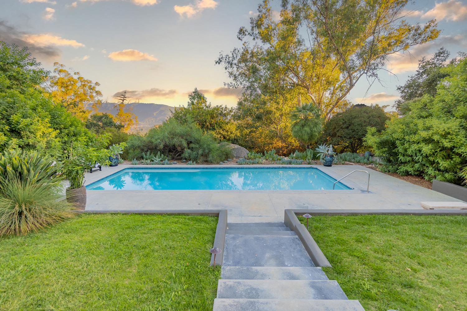 276 Running Ridge Trail Ojai, CA 93023 - Photo 23 of 31 a view of a backyard with barn and a large tree