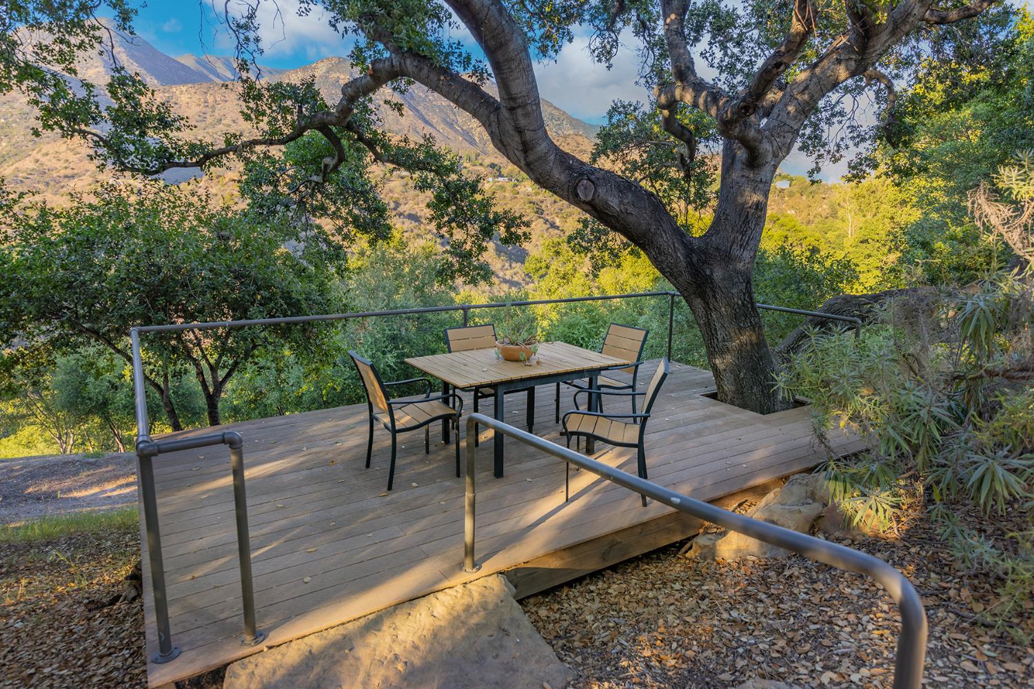 276 Running Ridge Trail Ojai, CA 93023 - Photo 26 of 31 a view of a chairs and table in the patio