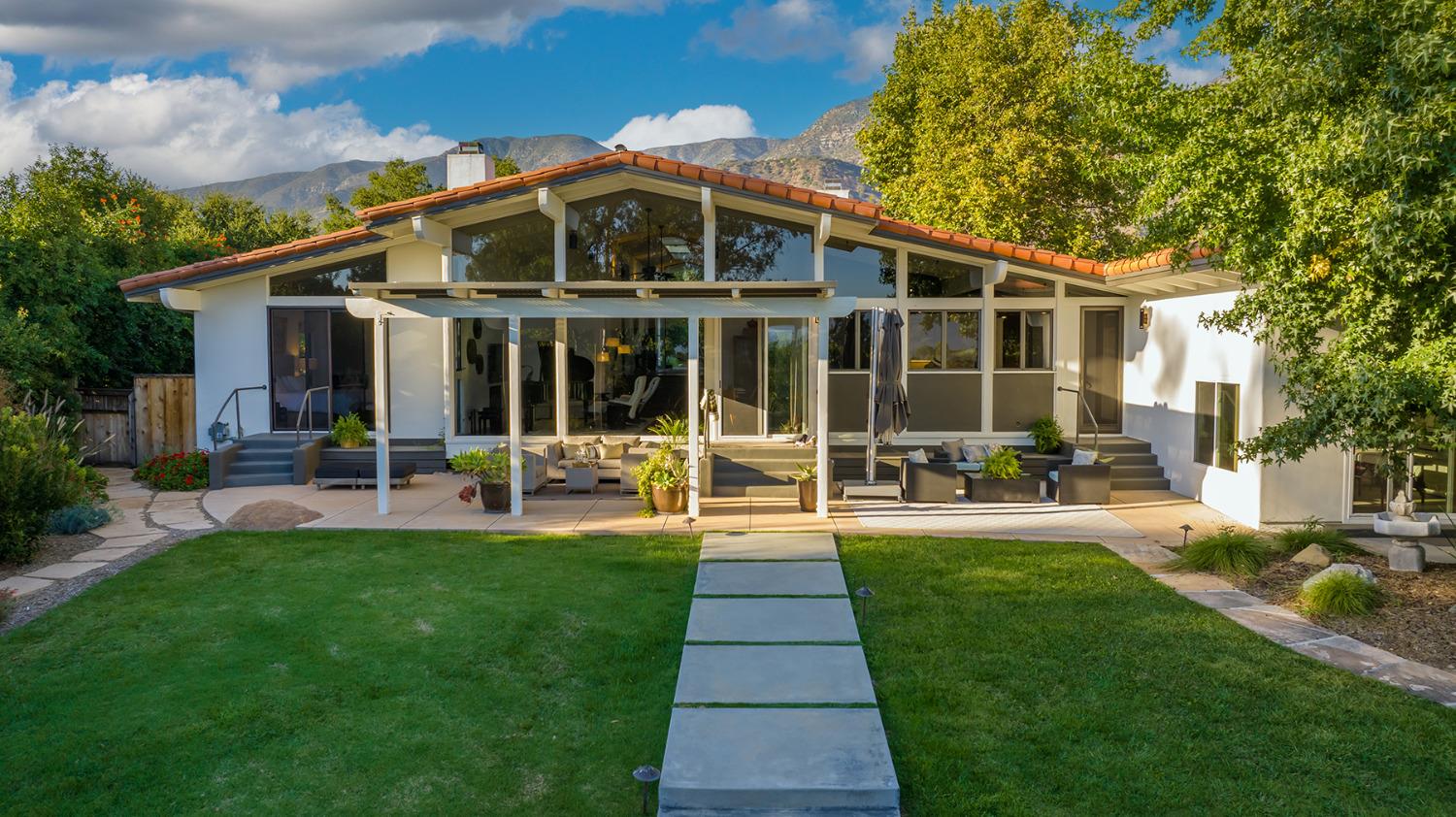 276 Running Ridge Trail Ojai, CA 93023 - Photo 5 of 31 a front view of a house with a yard table and chairs
