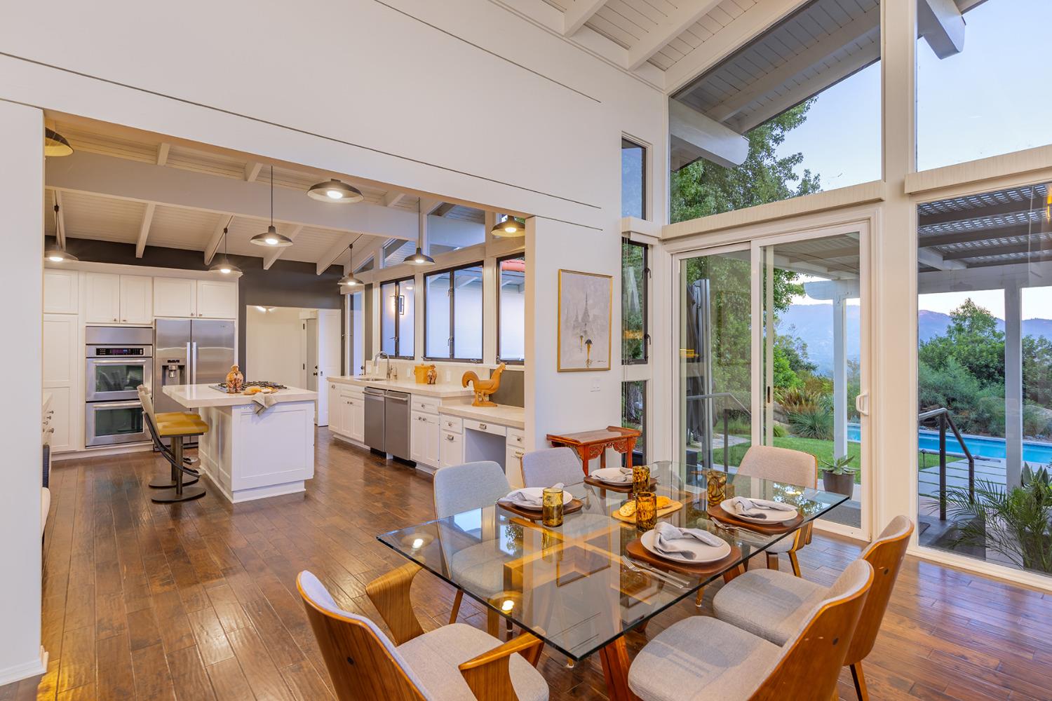 276 Running Ridge Trail Ojai, CA 93023 - Photo 10 of 31 a dining room with lots of furniture and a large window