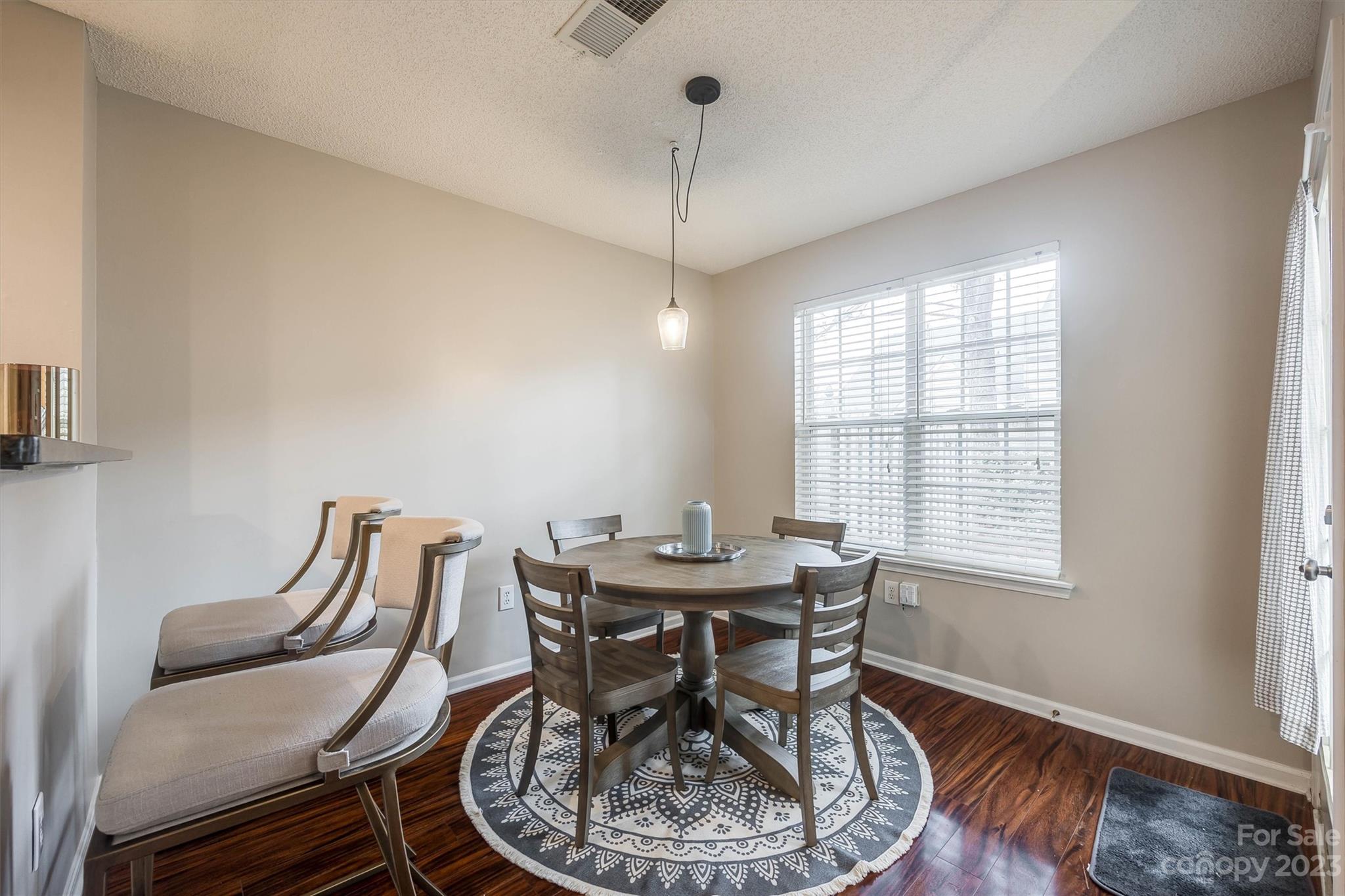 9725 Mattforest Circle Charlotte, NC 28277 - Photo 15 of 29 a view of a dining room with furniture window and outside view