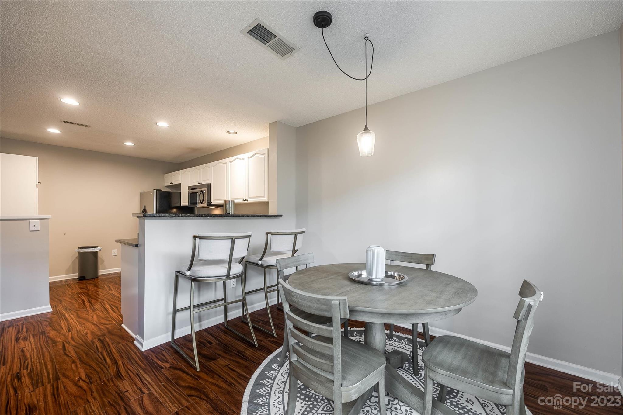 9725 Mattforest Circle Charlotte, NC 28277 - Photo 16 of 29 a view of a dining room with furniture