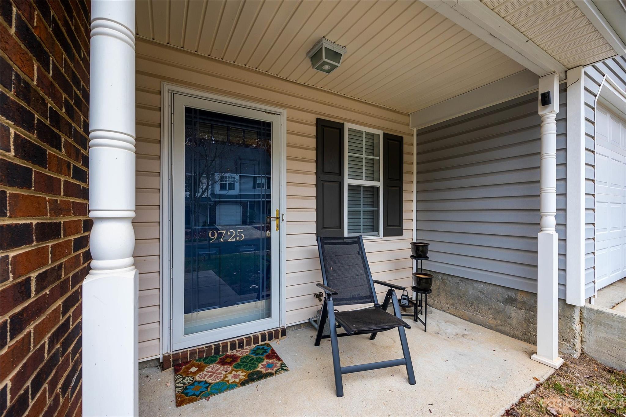 9725 Mattforest Circle Charlotte, NC 28277 - Photo 2 of 29 a balcony with table and chairs and a barbeque