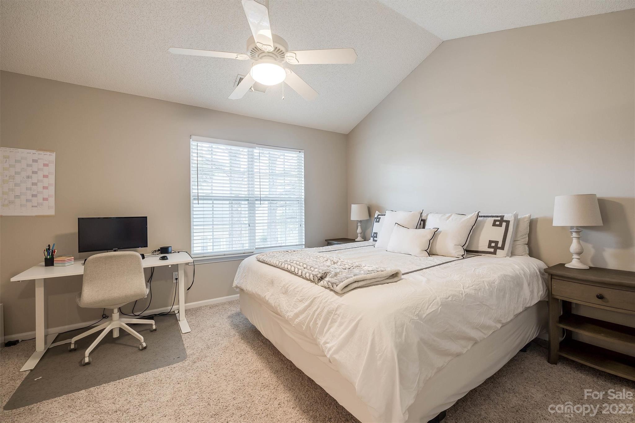 9725 Mattforest Circle Charlotte, NC 28277 - Photo 22 of 29 a bedroom with a bed a desk and chair