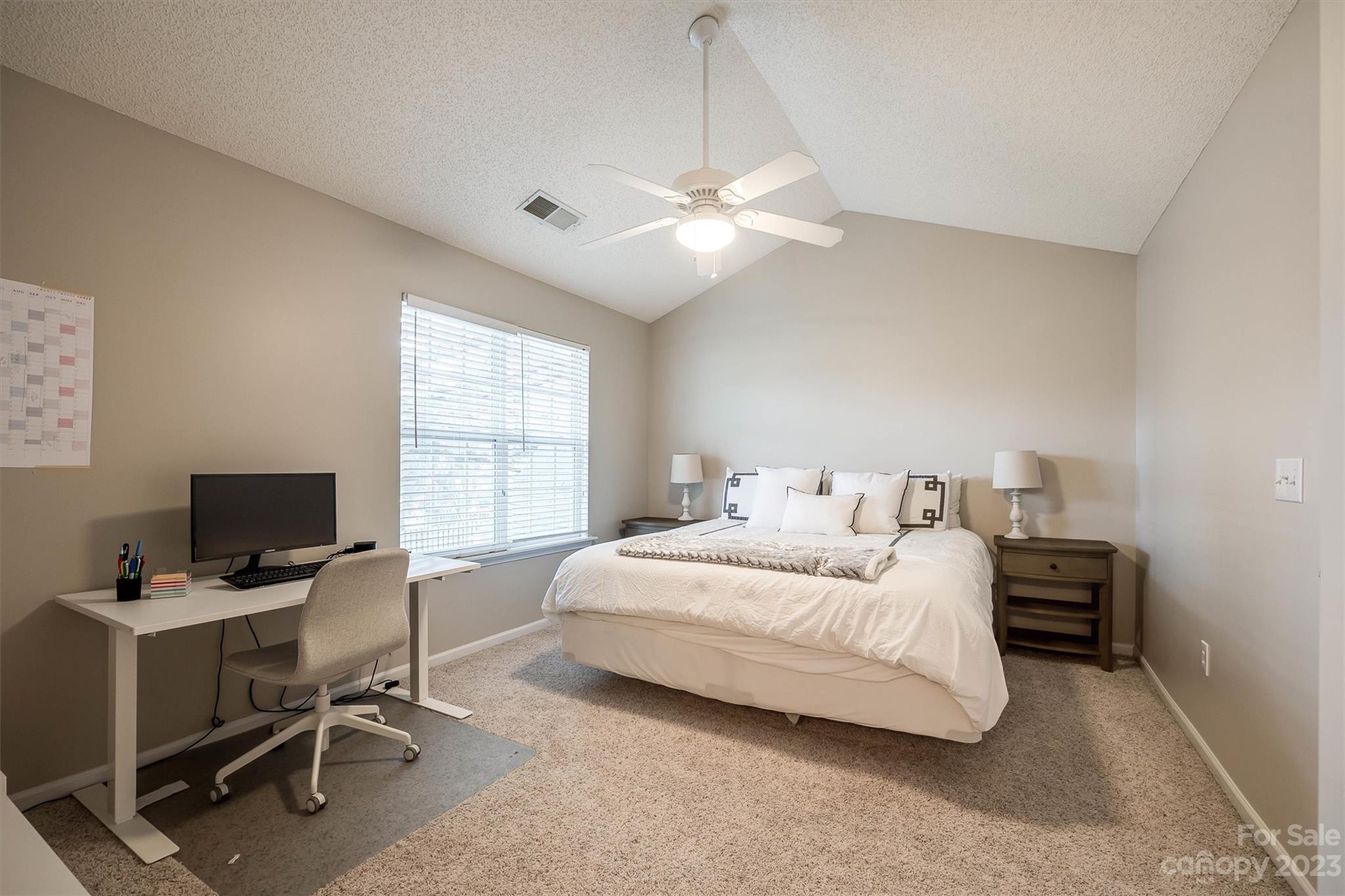 9725 Mattforest Circle Charlotte, NC 28277 - Photo 25 of 29 a bedroom with a bed and a window