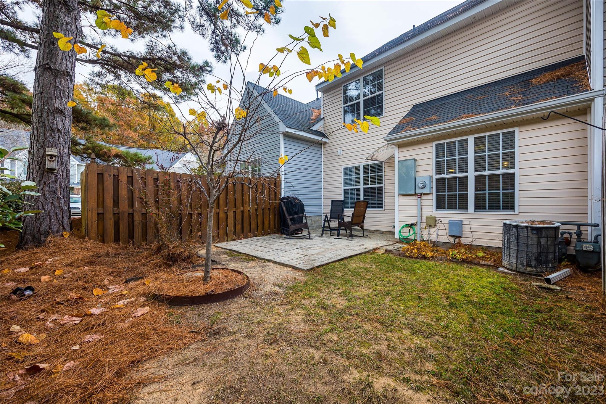 9725 Mattforest Circle Charlotte, NC 28277 - Photo 27 of 29 a view of the house with backyard and sitting area