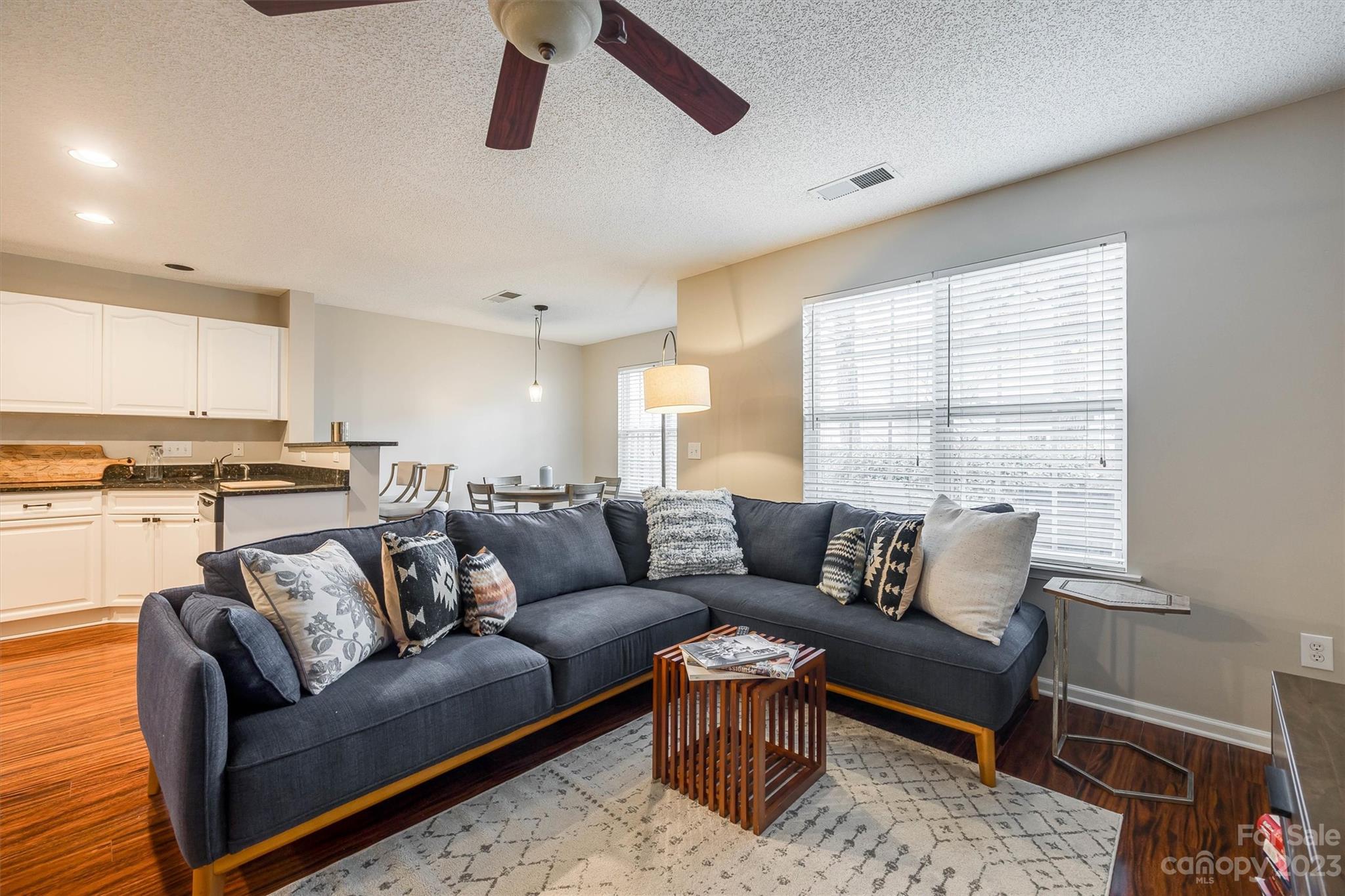 9725 Mattforest Circle Charlotte, NC 28277 - Photo 8 of 29 a living room with furniture and a large window