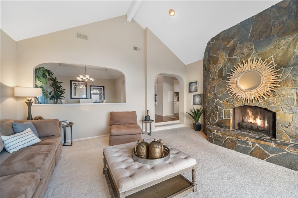 5 Marbella San Clemente, CA 92673 - Photo 9 of 49 a living room with furniture and a fireplace