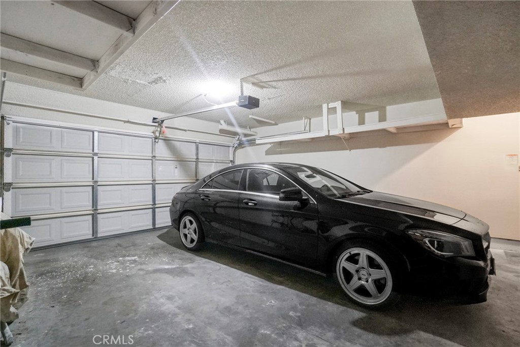 21602 South Figueroa Street, Unit 10 Carson, CA 90745 - Photo 21 of 25 a car parked in a garage