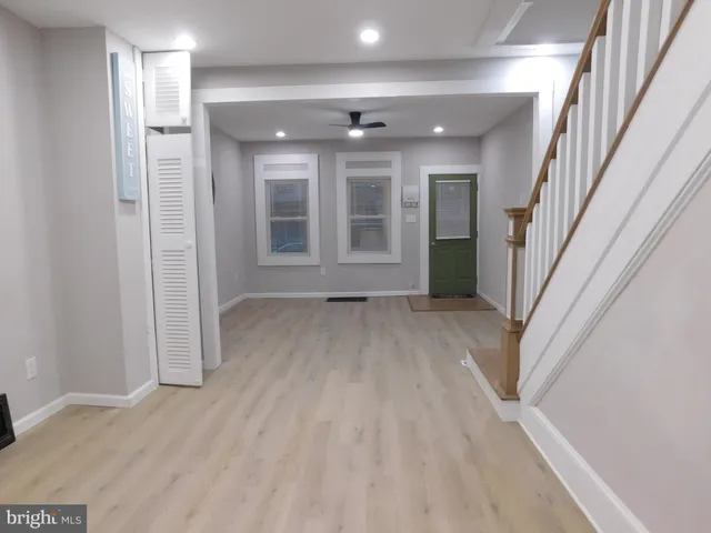 a kitchen with granite countertop a sink and a window