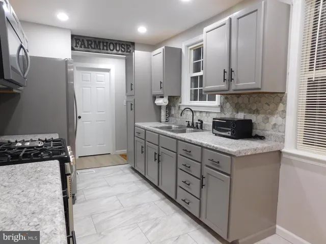 a view of a room that has a window in it