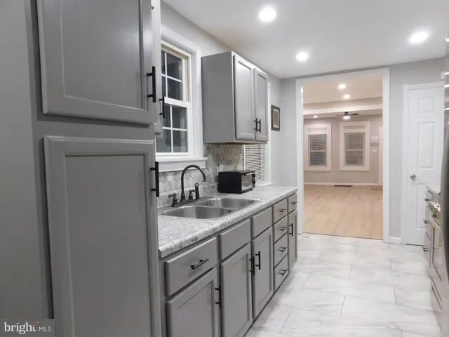 a bathroom with a toilet and a sink