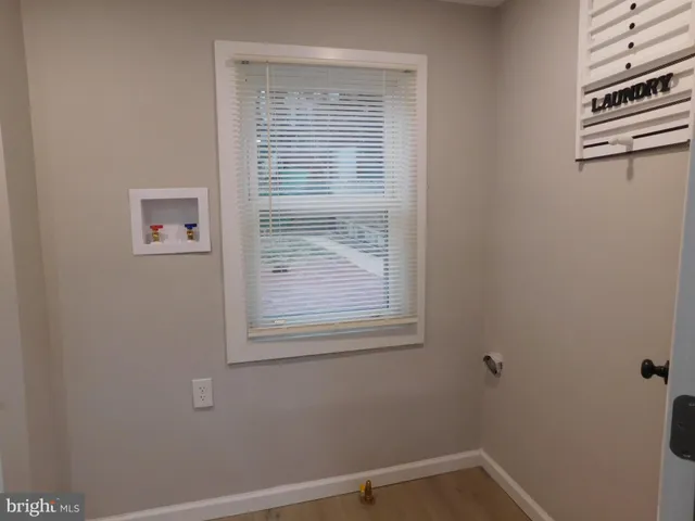 a house view with a backyard space