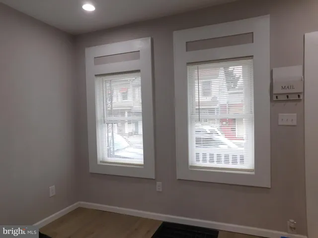 a view of entryway with wooden floor