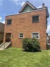 5839 Darlington Road, Unit 1 Pittsburgh, PA 15217 - Photo 2 of 18 a backyard of a house with seating space