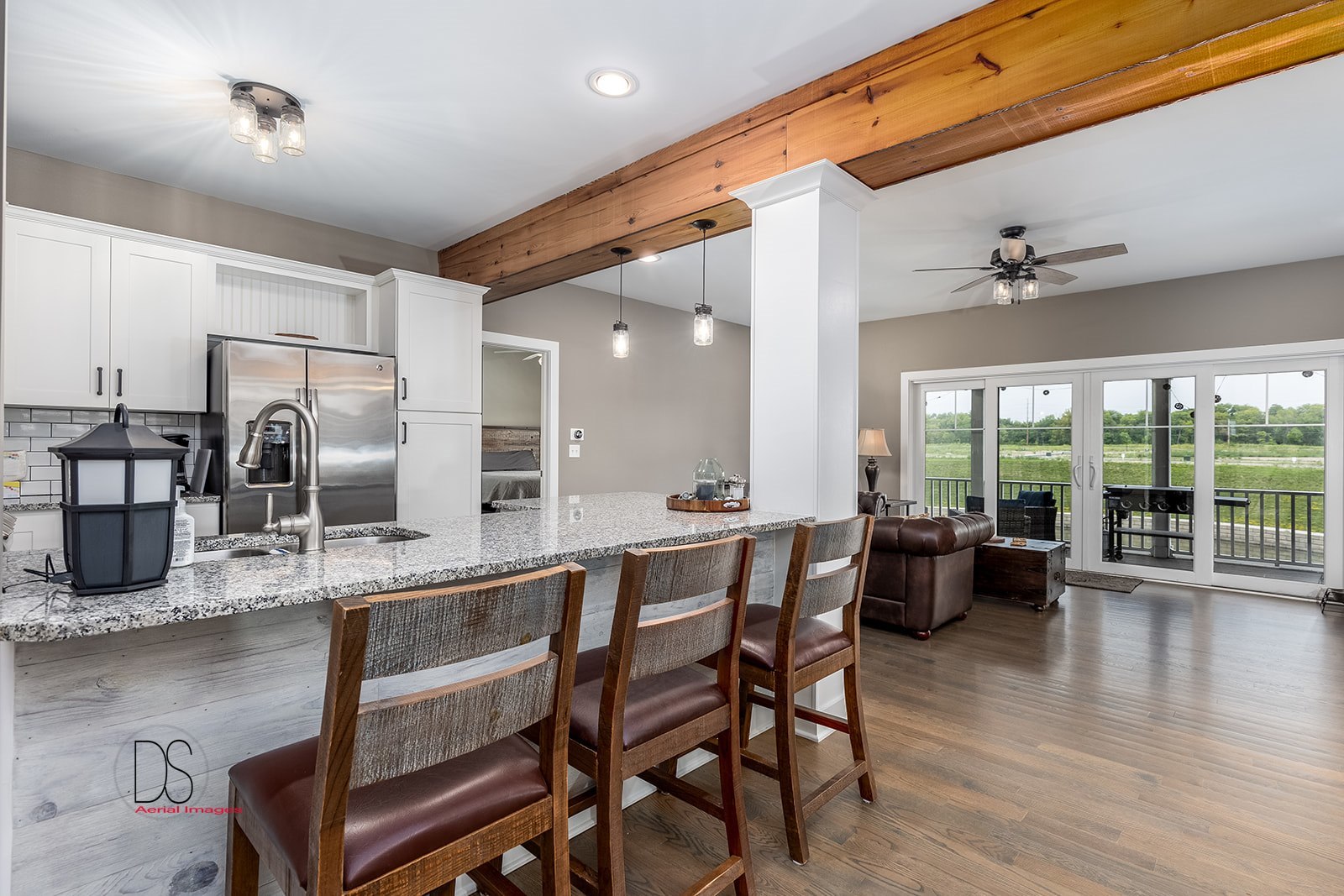 14 Waterside Way Ottawa, IL 61350 - Photo 18 of 36 a dining hall with stainless steel appliances granite countertop a table chairs and a view of living room