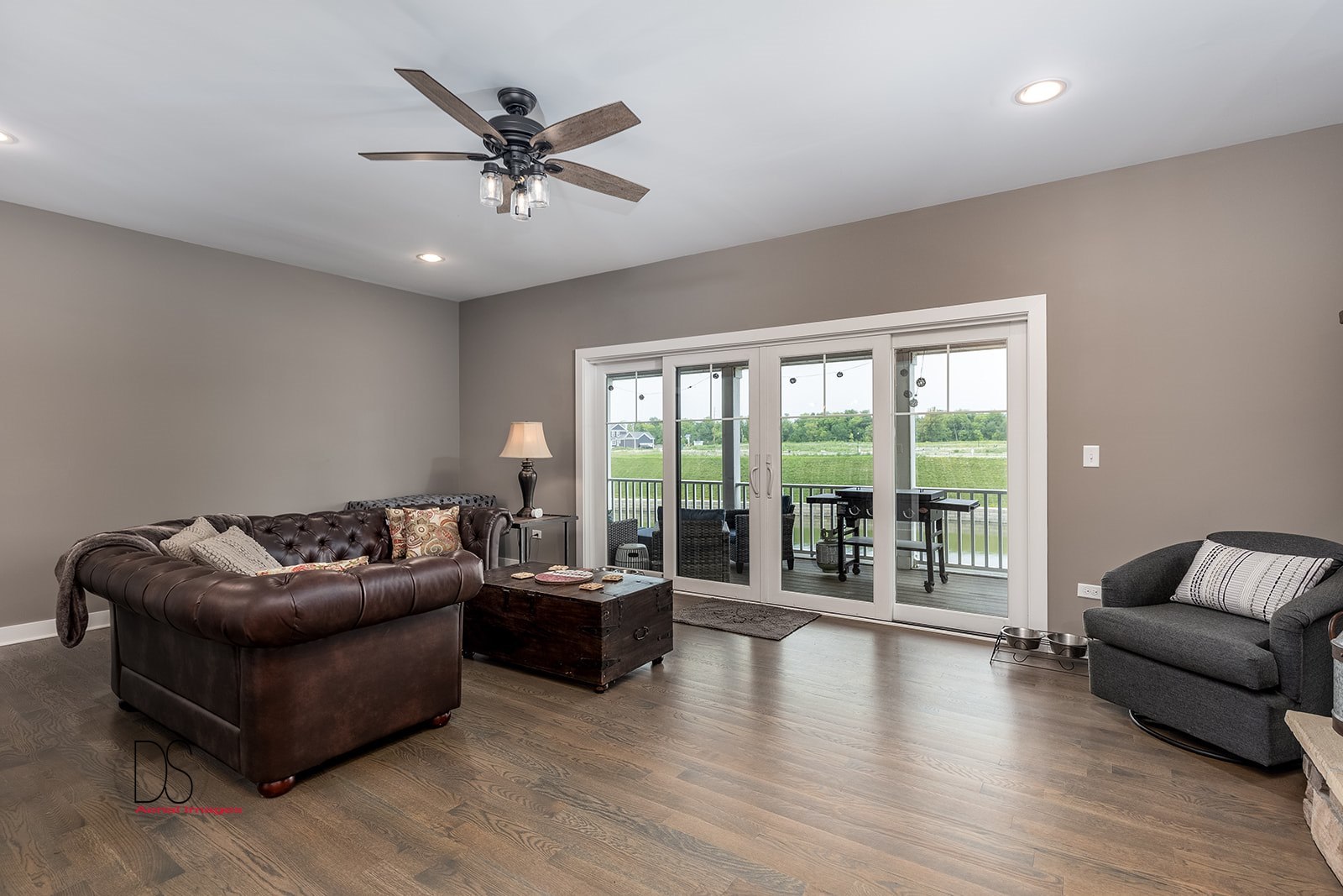 14 Waterside Way Ottawa, IL 61350 - Photo 21 of 36 a living room with furniture and a large window with wooden floor