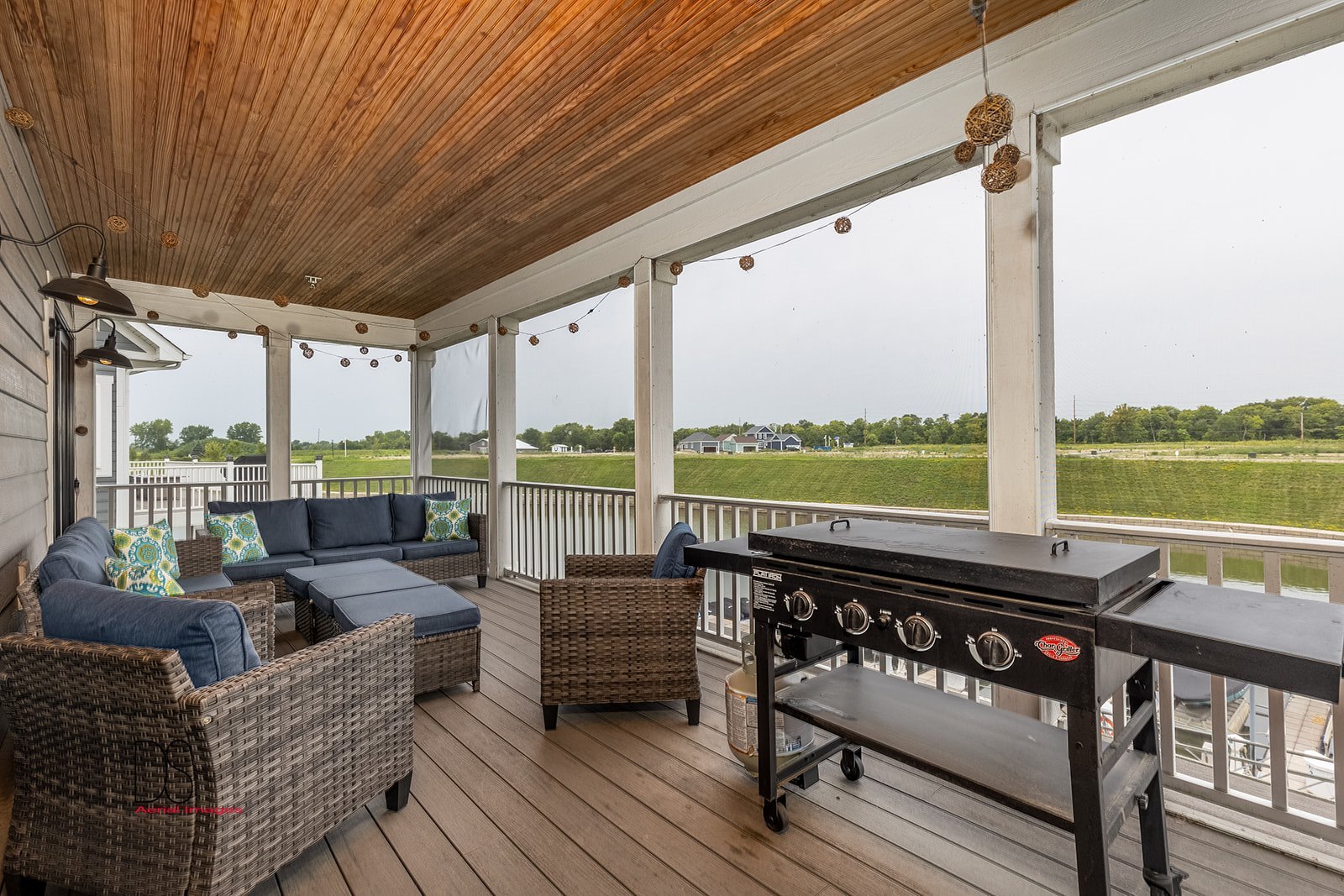 14 Waterside Way Ottawa, IL 61350 - Photo 23 of 36 a balcony with furniture and a floor to ceiling window