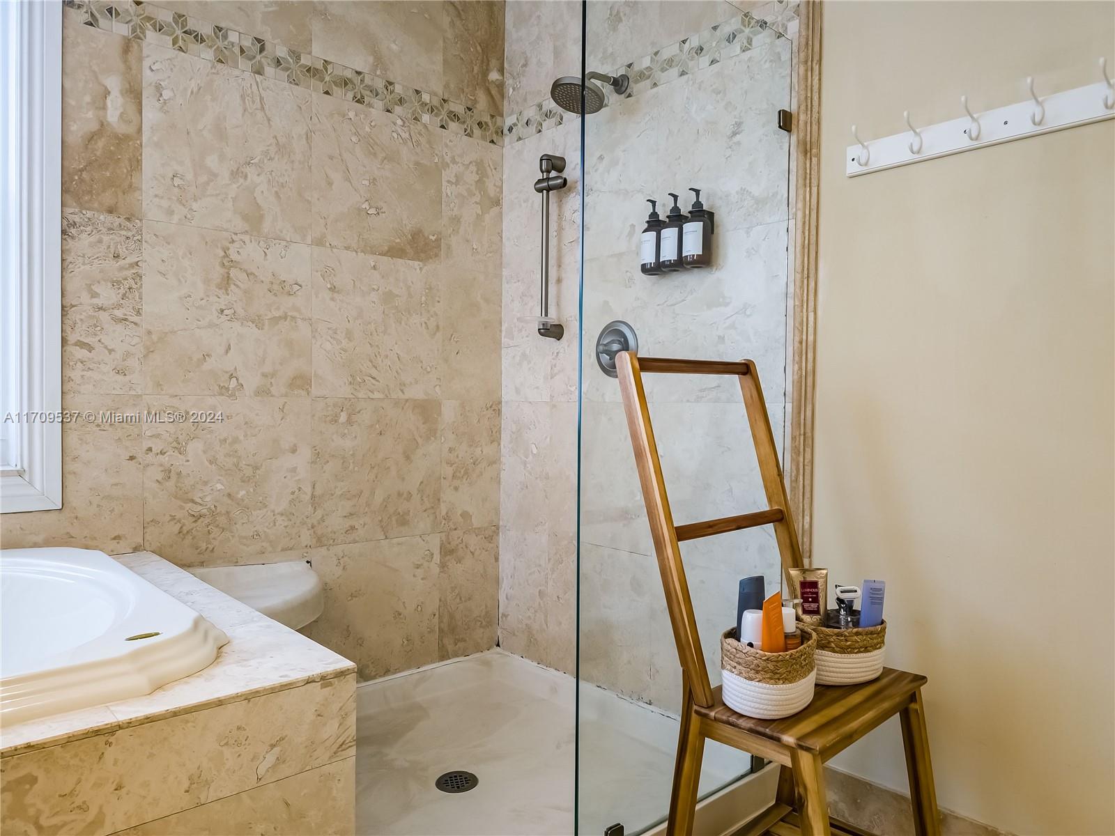 18199 Southwest 3rd Street Pembroke Pines, FL 33029 - Photo 24 of 31 a bathroom with a sink and a shower