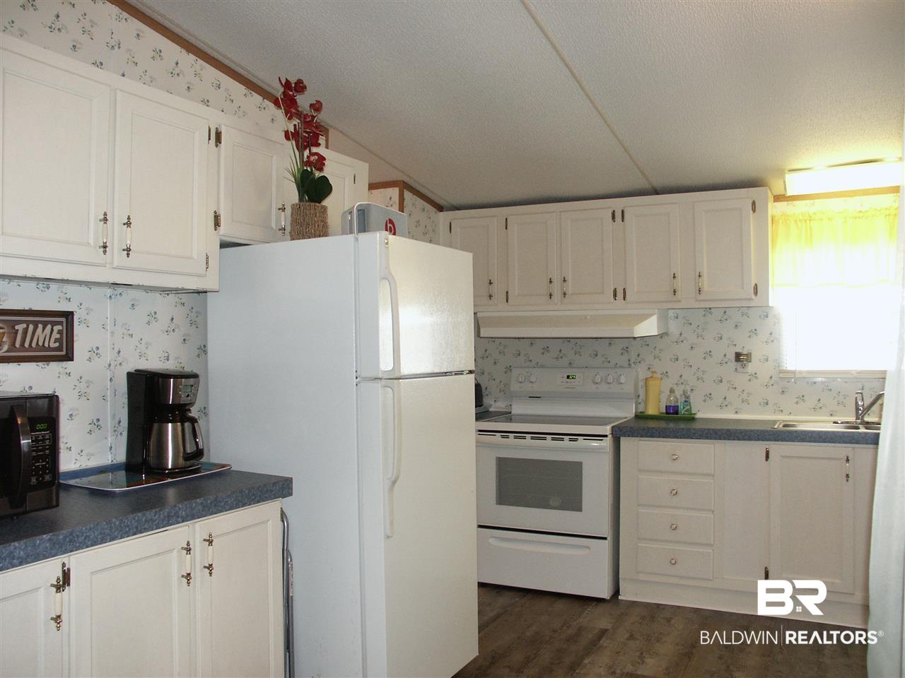1634 Matias Drive Lillian, AL 36549 - Photo 6 of 19 Kitchen with Appliances