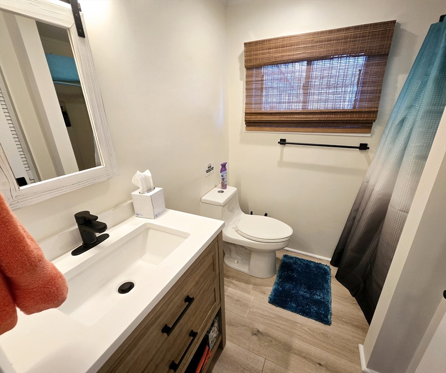 68 Southern Boulevard, Unit WINTER Newbury, MA 01951 - Photo 13 of 15 a bathroom with a sink and a mirror