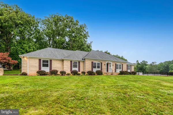 a view of a house with a big yard