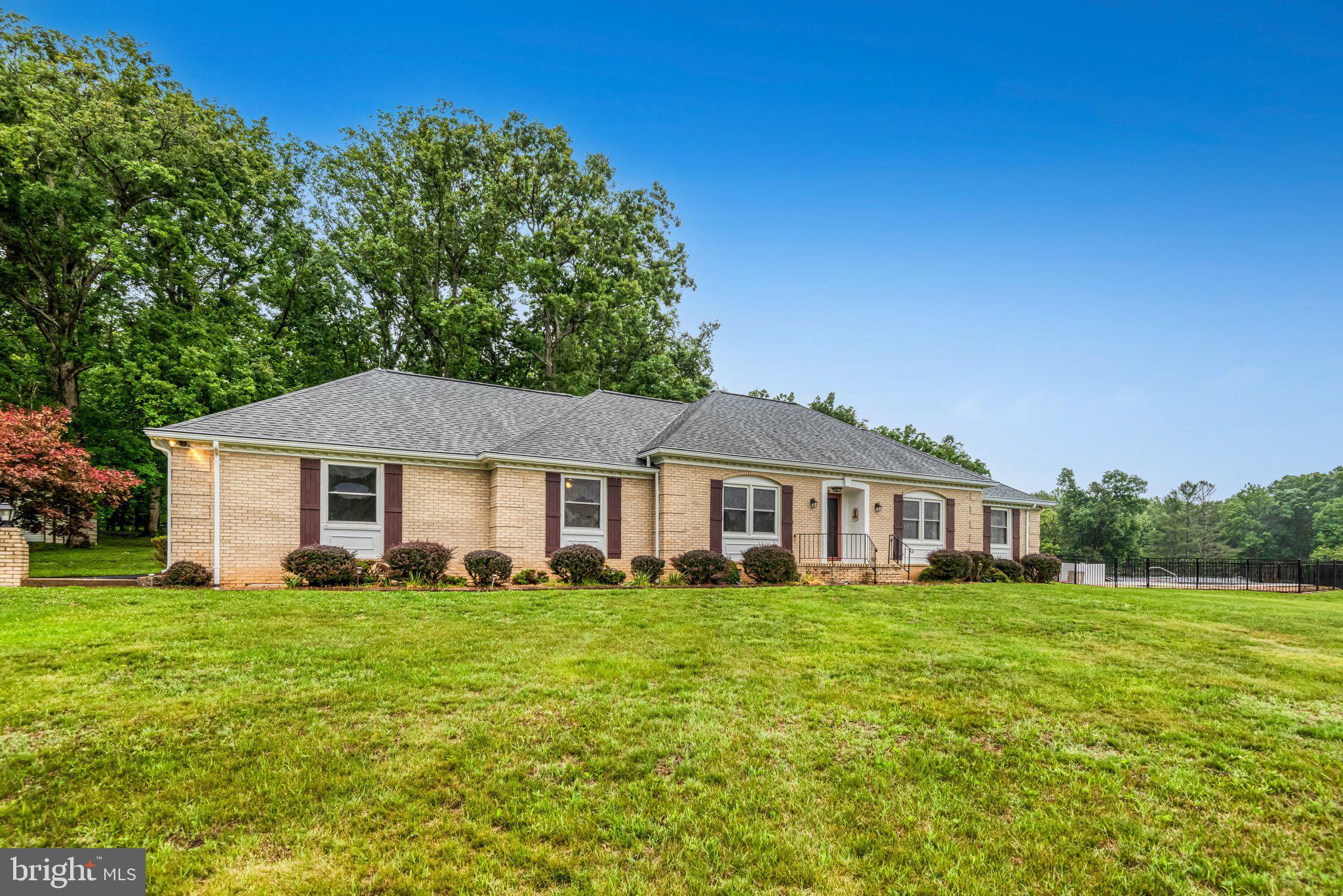 7961 Leeds Manor Road Marshall, VA 20115 - Photo 1 of 40 a view of a house with a big yard