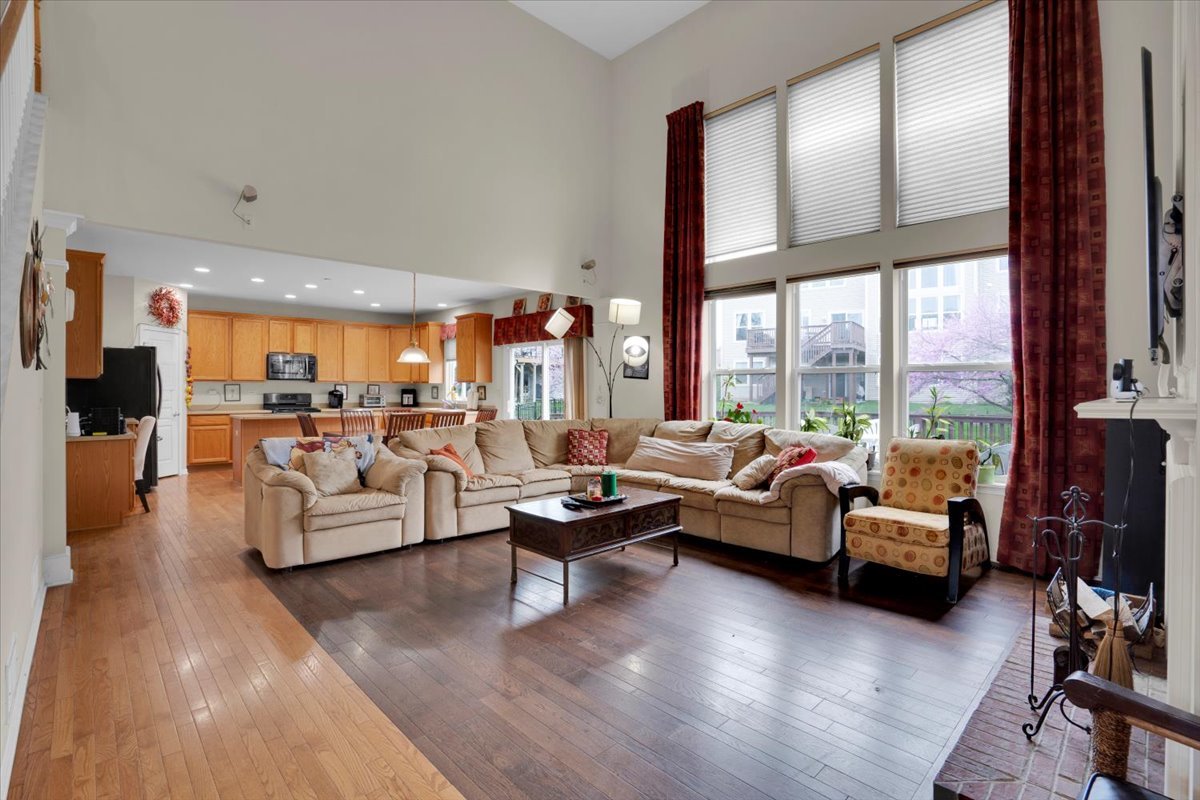 7 Springbrook Court Streamwood, IL 60107 - Photo 10 of 36 a living room with furniture and large windows
