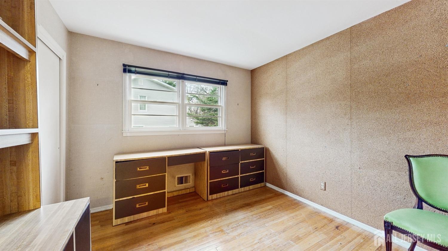 4 Whitewood Road Edison, NJ 08820 - Photo 18 of 31 a view of an empty room with furniture and a window