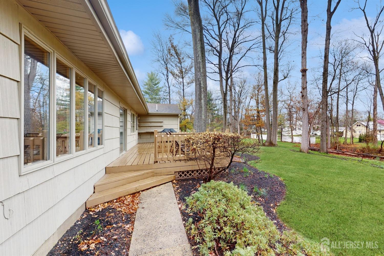 4 Whitewood Road Edison, NJ 08820 - Photo 25 of 31 a view of a house with backyard and sitting area