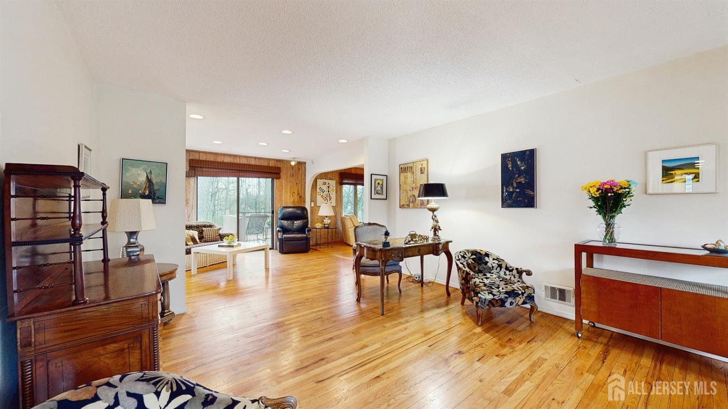 4 Whitewood Road Edison, NJ 08820 - Photo 4 of 31 a living room with furniture and a wooden floor