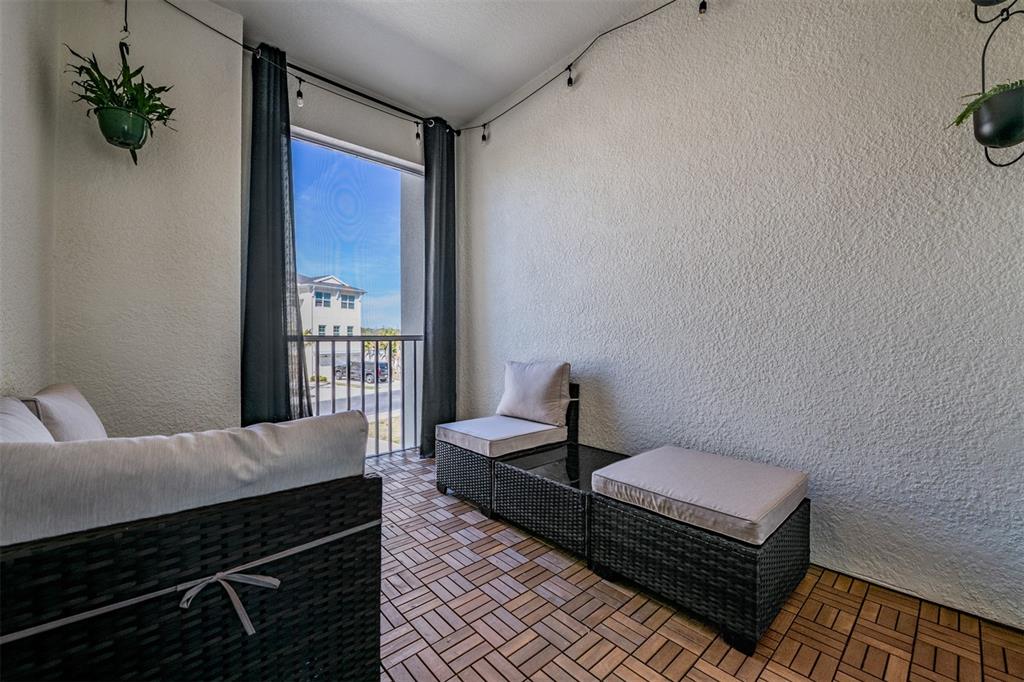 9916 Key Haven Road Seminole, FL 33777 - Photo 13 of 40 a bedroom with a bed and a window