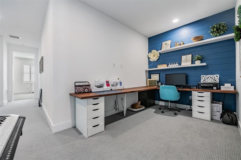 9916 Key Haven Road Seminole, FL 33777 - Photo 19 of 40 a room with furniture and a wooden floor