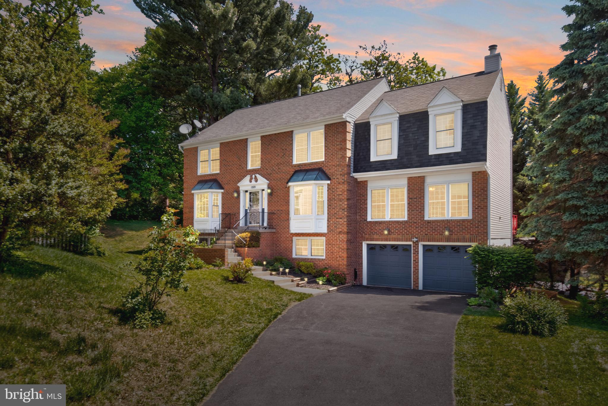 11601 Letterman Way Gaithersburg, MD 20878 - Photo 1 of 53 a front view of a house with a yard