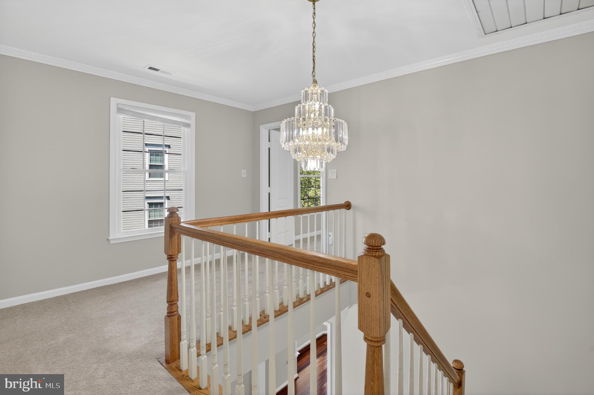 11601 Letterman Way Gaithersburg, MD 20878 - Photo 18 of 53 a view of entryway and hall with wooden floor