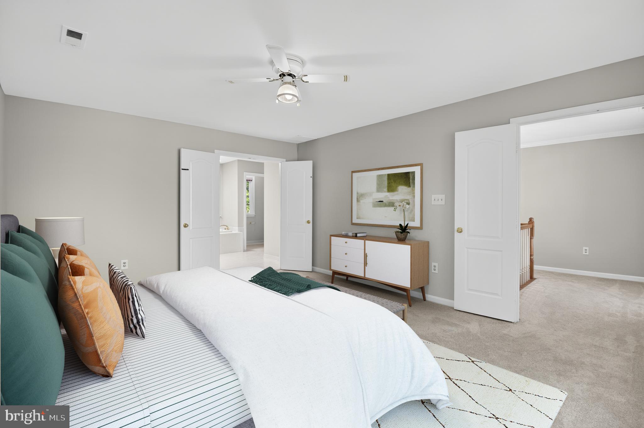 11601 Letterman Way Gaithersburg, MD 20878 - Photo 20 of 53 a bedroom with a bed and a chandelier