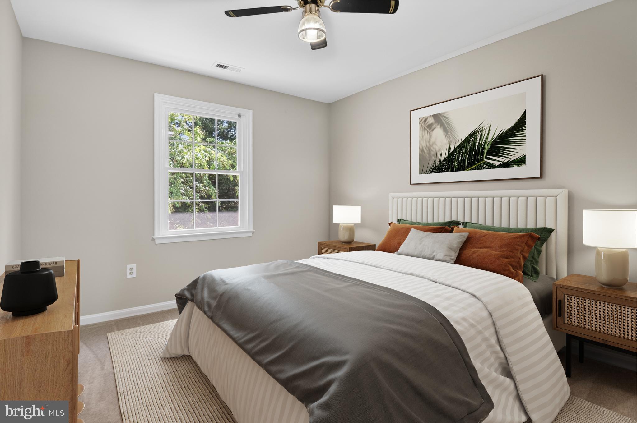 11601 Letterman Way Gaithersburg, MD 20878 - Photo 25 of 53 a bedroom with a bed and a painting on the wall