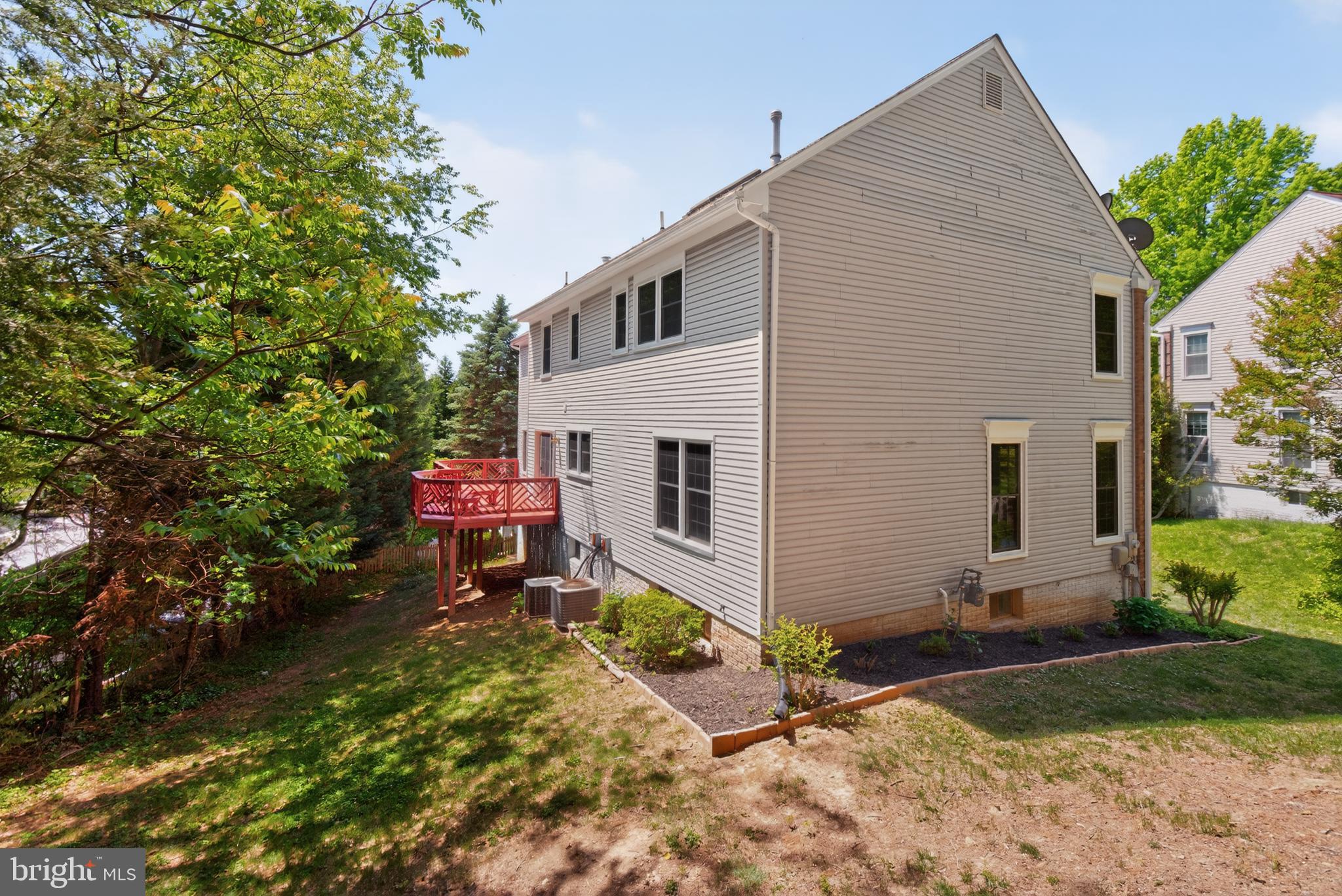 11601 Letterman Way Gaithersburg, MD 20878 - Photo 39 of 53 a front view of a house with a yard