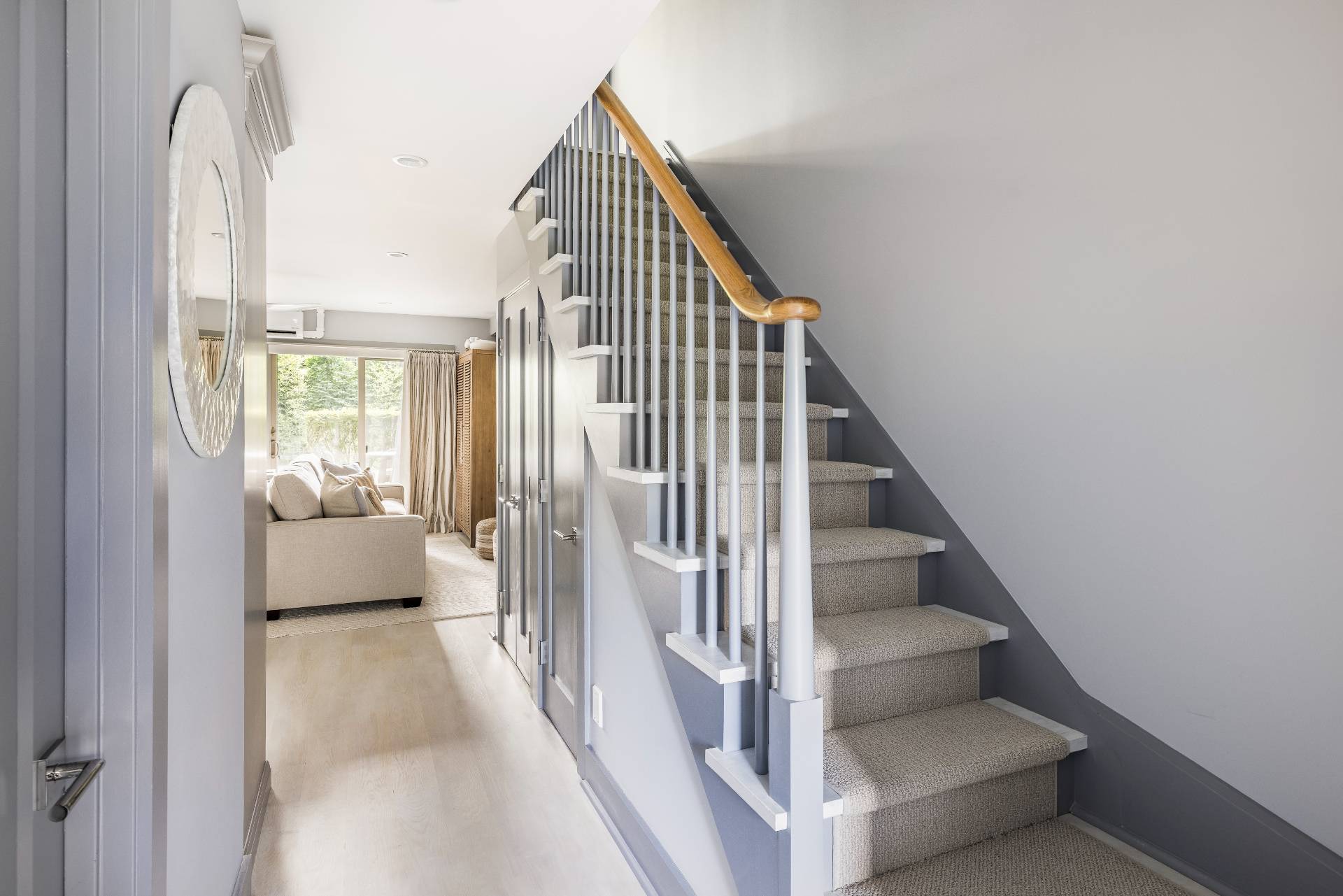 18 Bridge Street, Unit 3E Sag Harbor, NY 11963 - Photo 9 of 22 a view of entryway and hall with wooden floor
