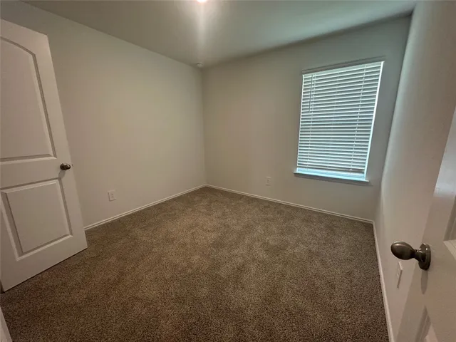 a view of a room with windows