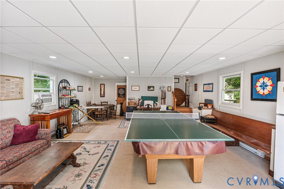 5700 Elfinwood Road Chester, VA 23831 - Photo 36 of 38 a room with furniture and a flat screen tv